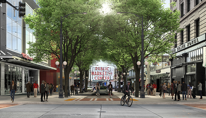 Rendering of proposed improvements on the 100 Pike Street block. There are wide sidewalks and a curbless street filled
                            with pedestrians. The street is lined with trees on both sides and people riding bicycles alongside cars with the Public
                            Market sign in the background.